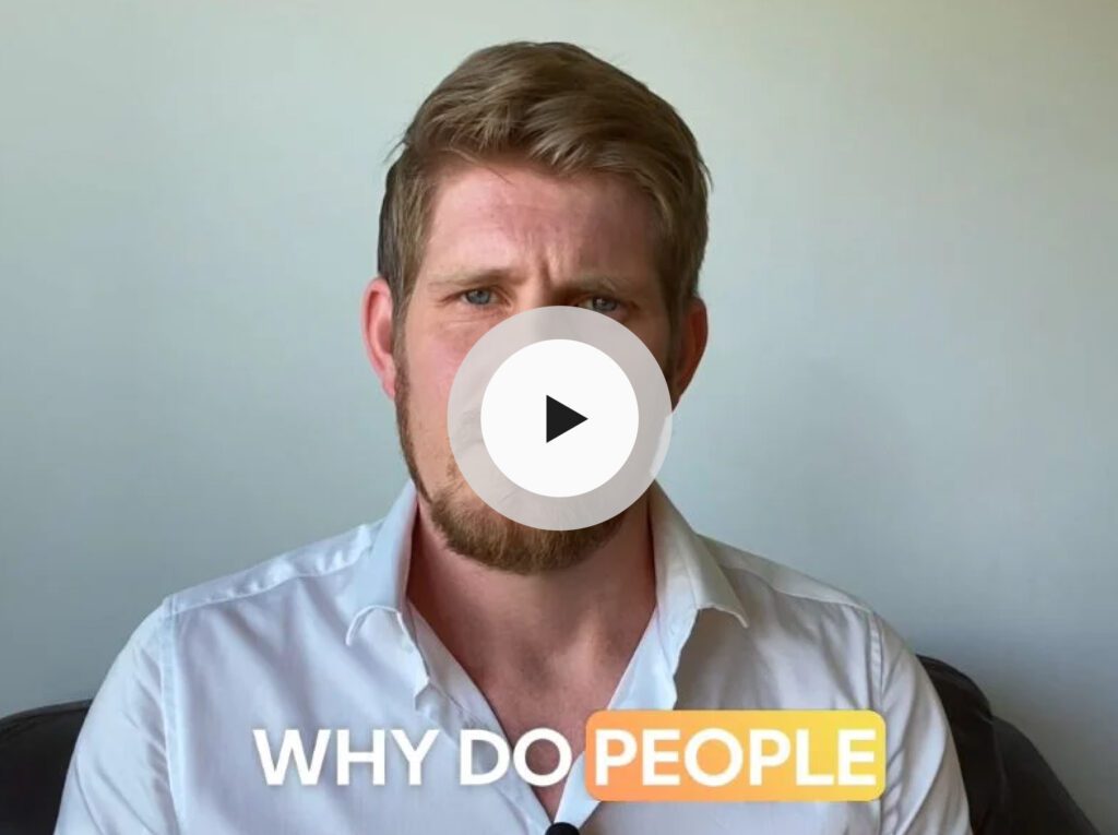 Man in white shirt discussing the cost of procrastination in property investment during video presentation.