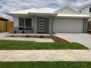 Front view of a modern SDA-compliant house in Greenbank, Queensland, used in a High Physical Support NDIS tenancy.